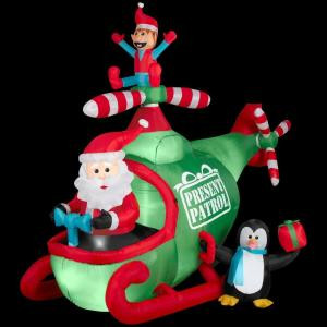 89.76 in. W x 56.69 in. D x 74.8 in. H Animated Inflatable Santa and Friends Helicopter