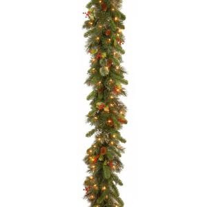 9 ft. Wintry Pine Garland with Pinecones, Red Berries, Snowflakes and 100 Clear Lights